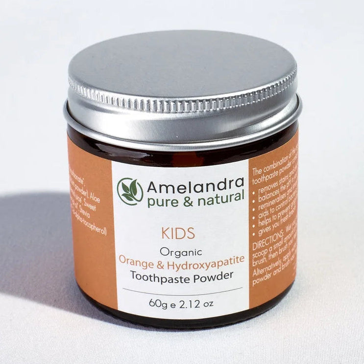 Amelandra Kids toothpaste powder jar on a white background
