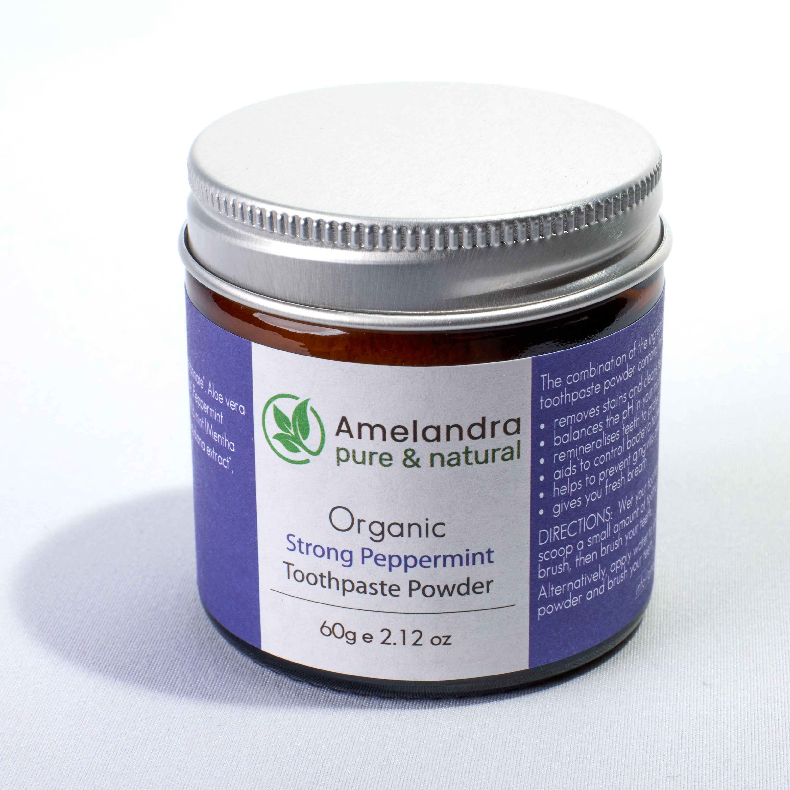 Amelandra organic strong peppermint toothpaste powder jar on a white background