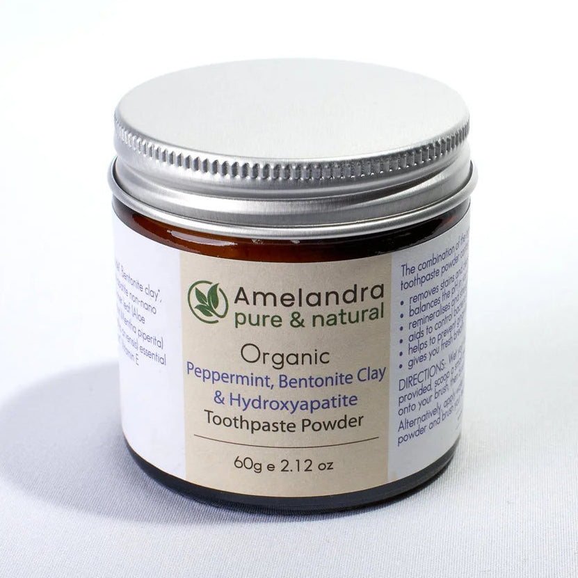 Amelandra toothpaste powder jar on a white background