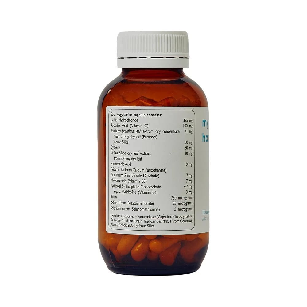 Bottle of capsules with a label on a white background