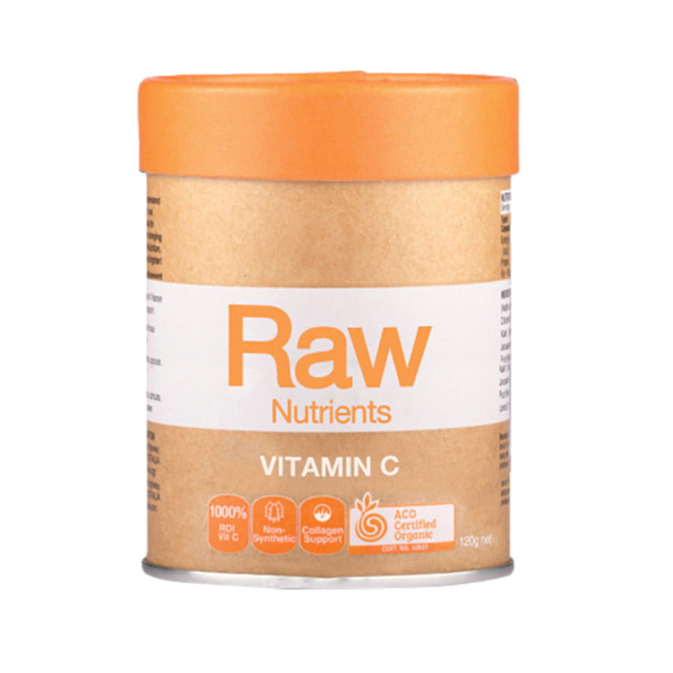 A container of Amazonia Raw Nutrients Vitamin C powder in Passionfruit Flavour. The container is beige with an orange lid, and the label displays 'Raw Nutrients' and 'VITAMIN C'.
